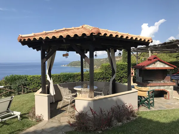 Garden gazebo and BBQ area at Palamidi with sea view